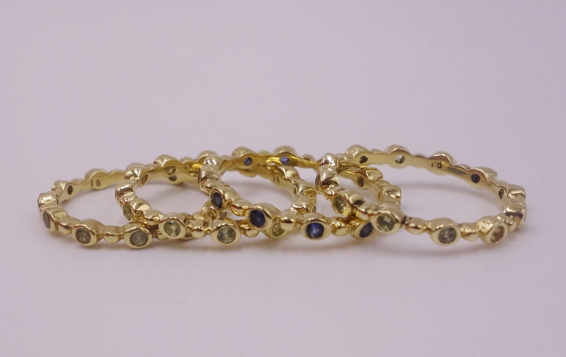 Unending Circle Gold Ring with Rubies