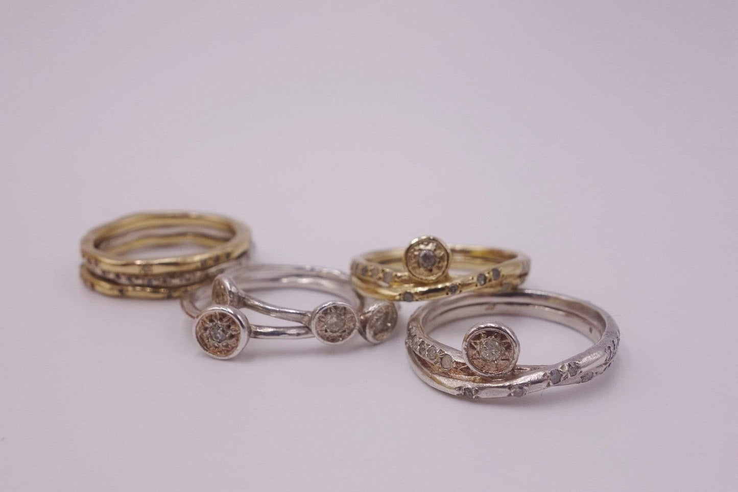 Seven Stackable Gold and Silver Rings