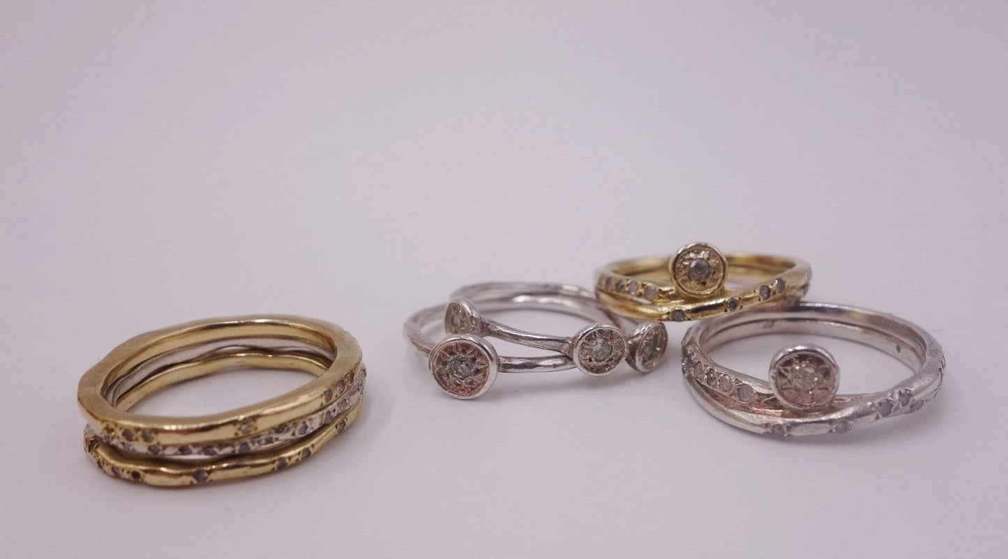 Seven Stackable Gold and Silver Rings