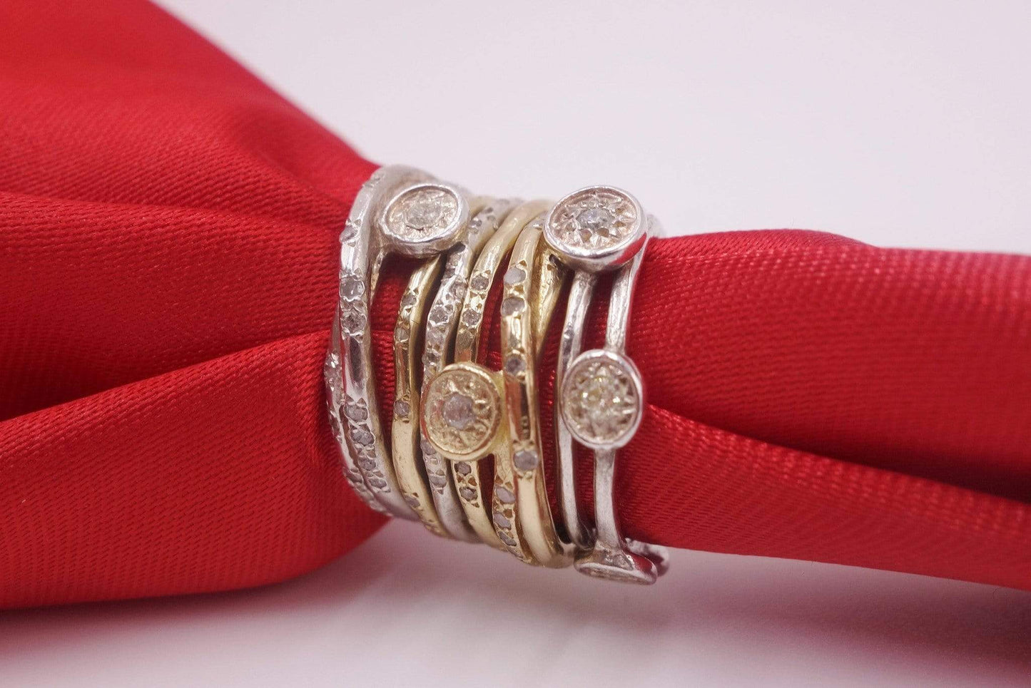 Seven Stackable Gold and Silver Rings
