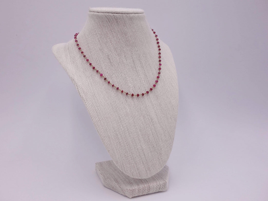 Ruby necklace wrapped with 18kt gold
