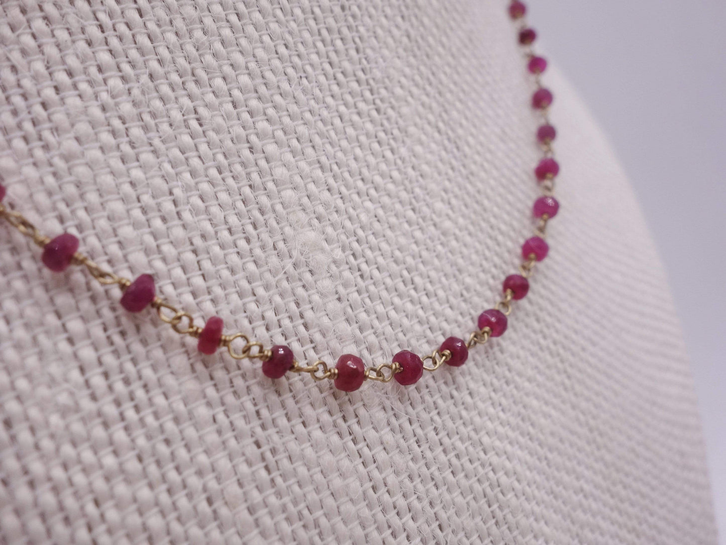 Ruby necklace wrapped with 18kt gold