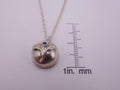 Delicate Silver Flower Pendant with Blue Sapphire