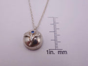 Delicate Silver Flower Pendant with Blue Sapphire