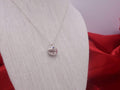 Delicate Silver Flower Pendant with Blue Sapphire