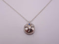 Delicate Silver Flower Pendant with Blue Sapphire