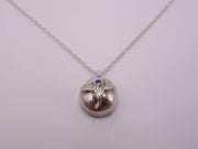 Delicate Silver Flower Pendant with Blue Sapphire