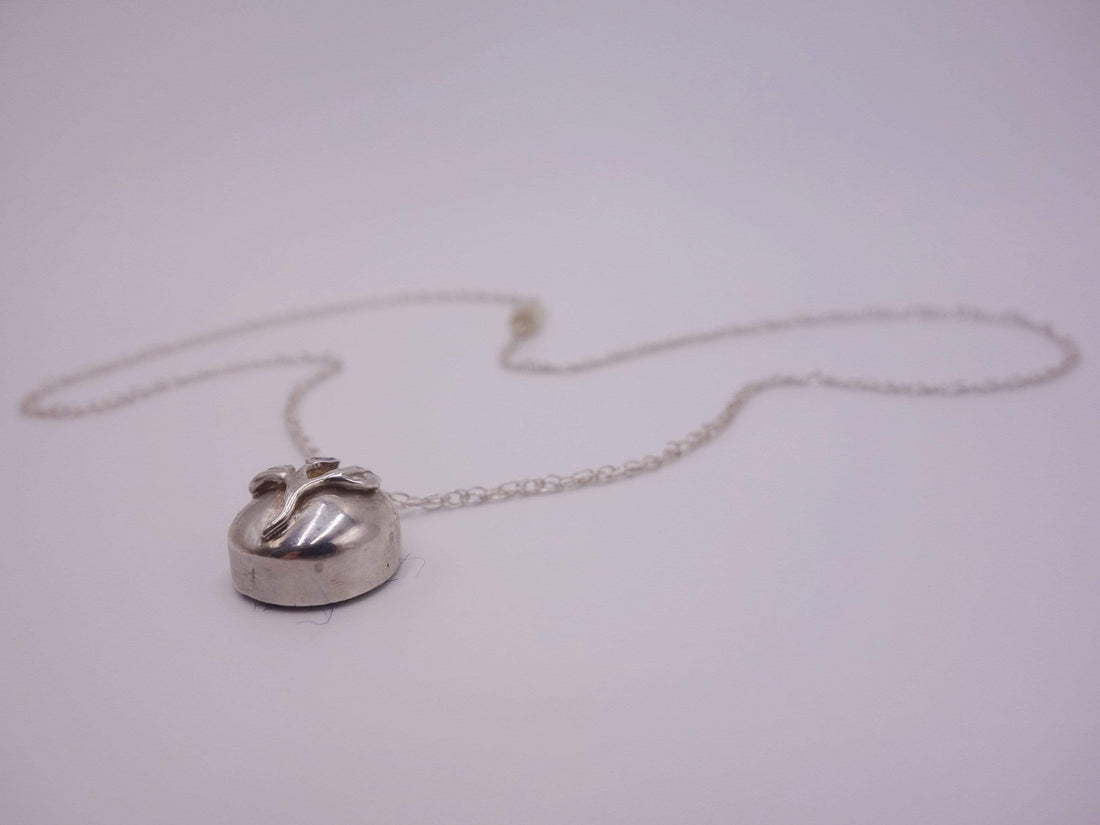 Delicate Silver Flower Pendant with Blue Sapphire