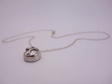 Delicate Silver Flower Pendant with Blue Sapphire