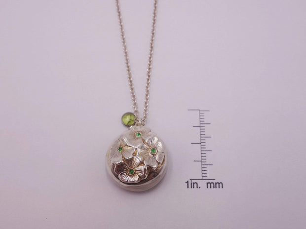 Silver dome pendant with emerald