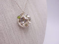 Silver dome pendant with emerald