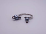 Silver ring with blue pearls and rubelites