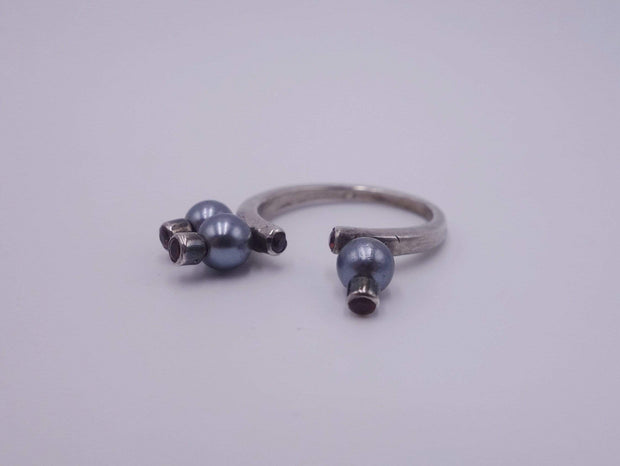 Silver ring with blue pearls and rubelites