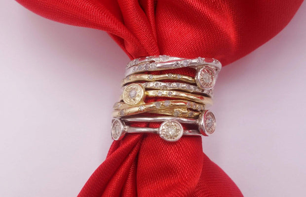 Seven Stackable Gold and Silver Rings