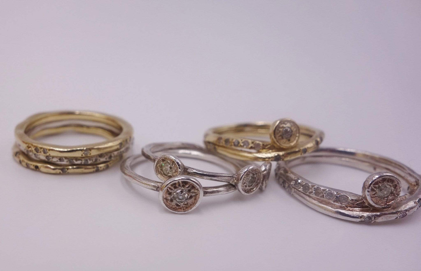 Seven Stackable Gold and Silver Rings