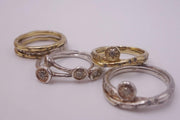 Seven Stackable Gold and Silver Rings