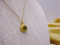 Hand formed 22kt gold peridot pendant 
