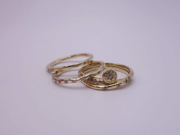 Intertwined Gold Rings with Diamonds