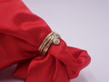 Intertwined Gold Rings with Diamonds
