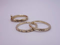 Intertwined Gold Rings with Diamonds