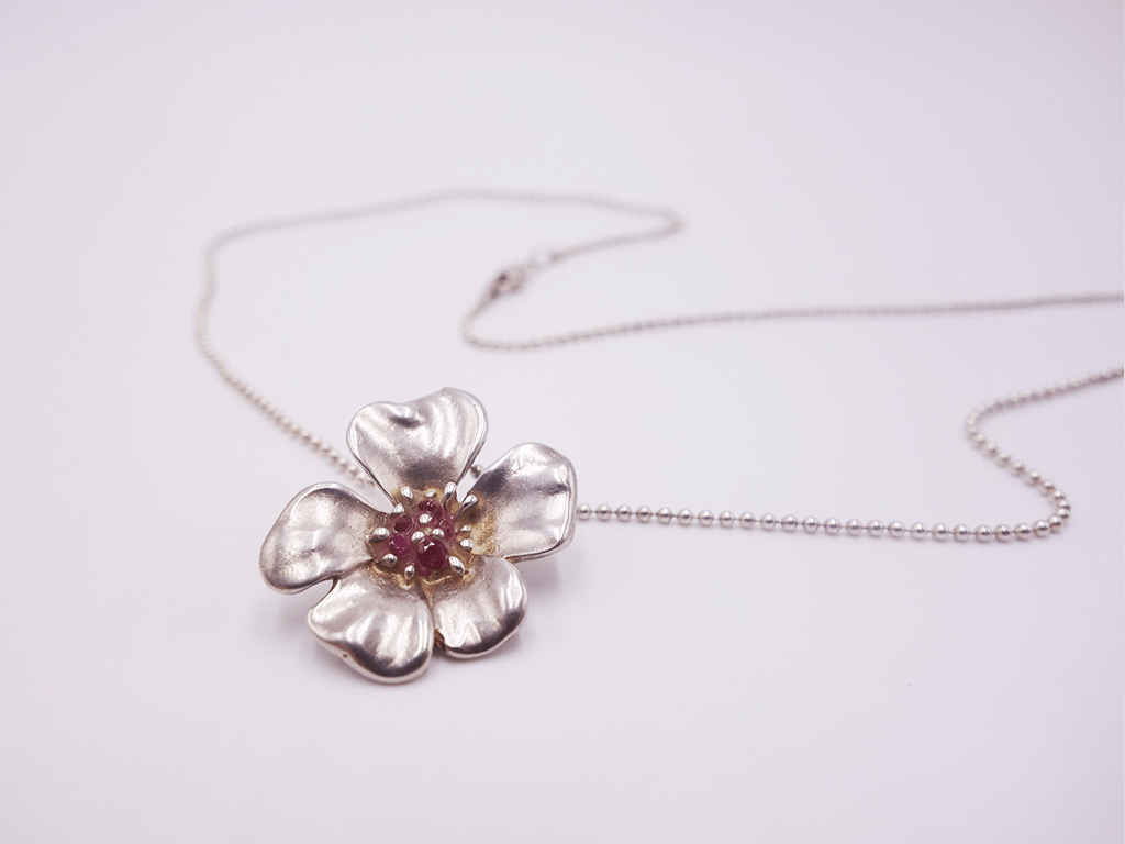 Silver Flower with Red Sparkle