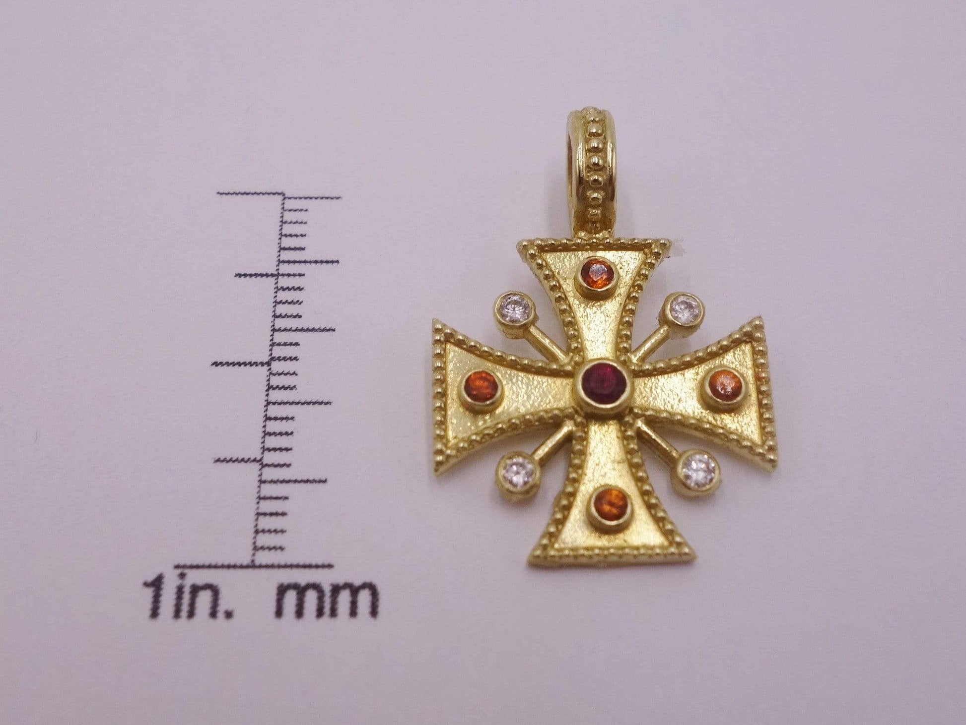 Gold Cross necklace pendant with diamonds, sapphires and a ruby